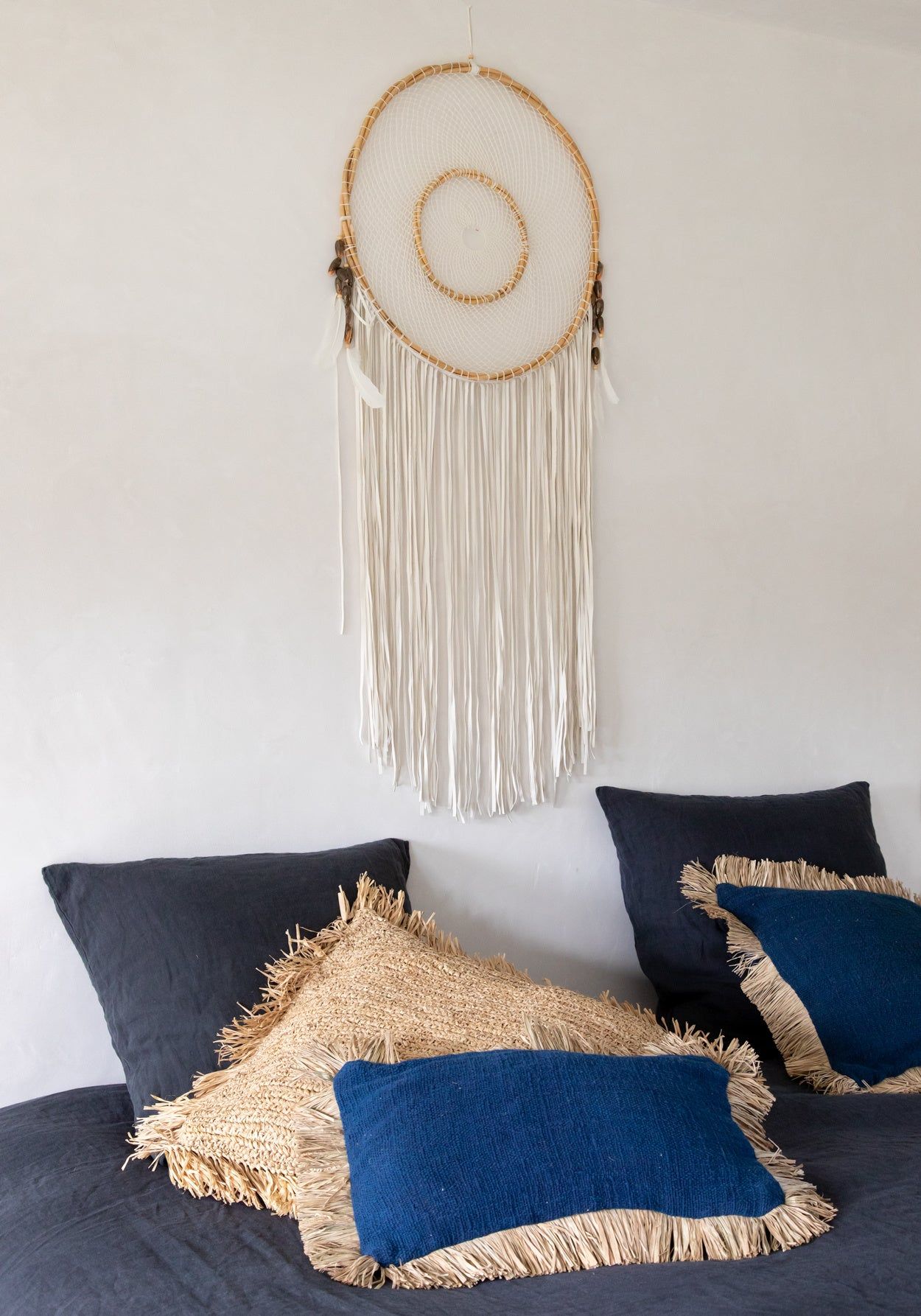 Housse de coussin bleue à frange - SAINT-TROPEZMaison Bloom Concept