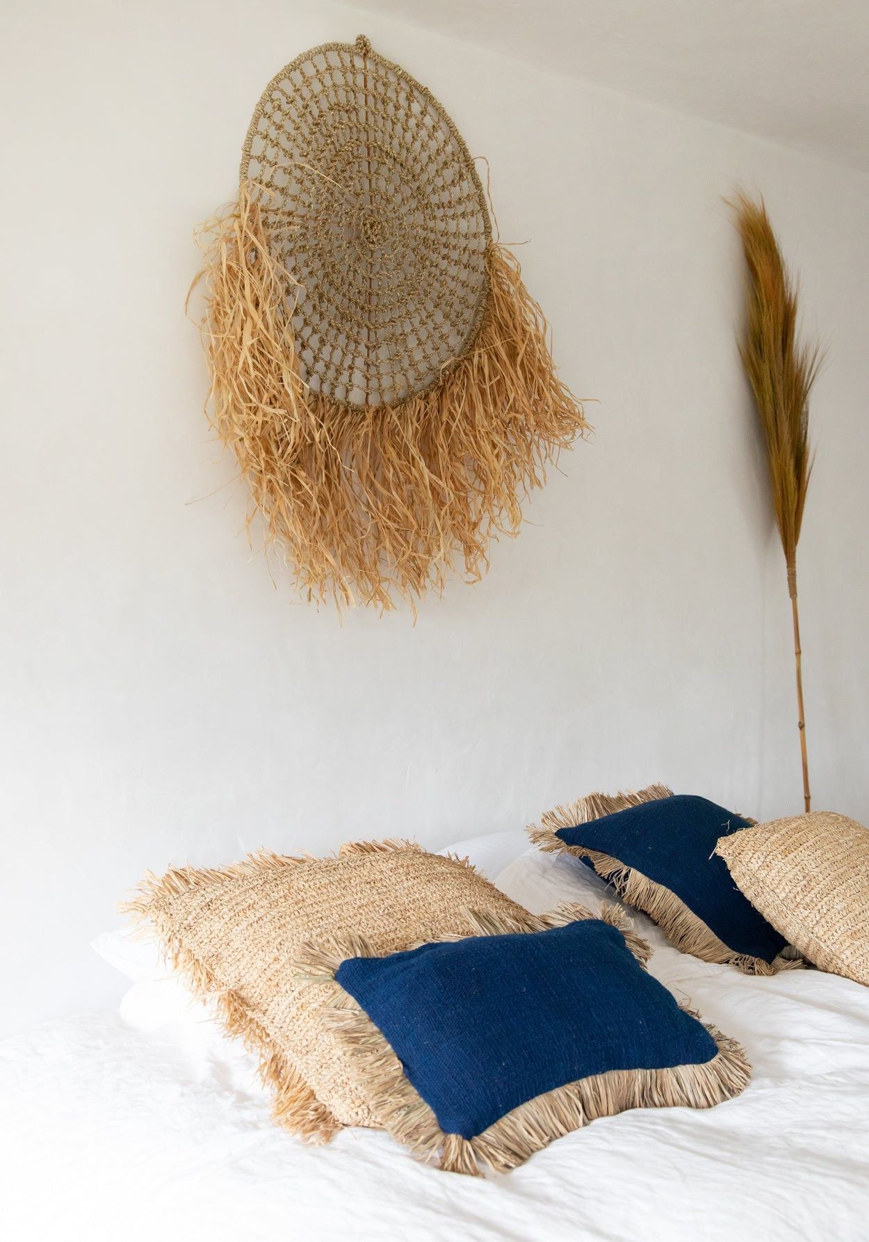 Housse de coussin bleue à frange - SAINT-TROPEZMaison Bloom Concept